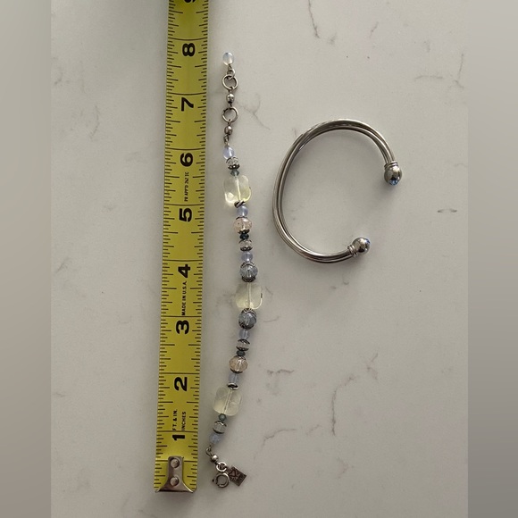 Blue and Silvertone Costume Bracelts. The beaded bracelet is by Desert Heart. - Picture 5 of 5